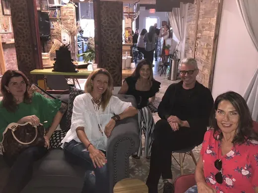 A group talking in a lounge