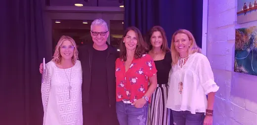 Five members of the Healthy Solutions community on a stage