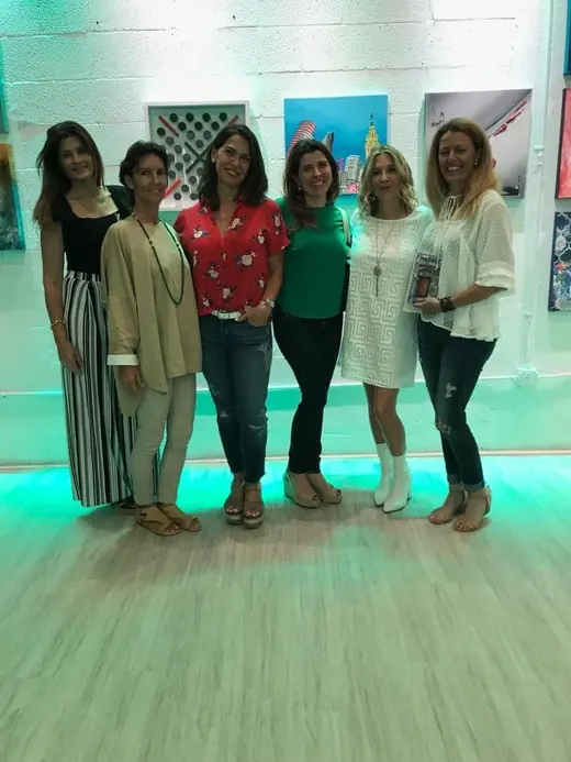 A group of six women at an event