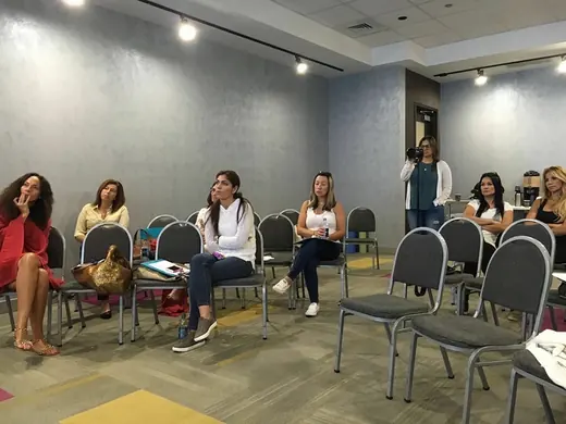 Participants seated in a circle during a workshop