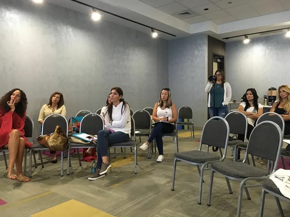Participants seated in a circle during a workshop