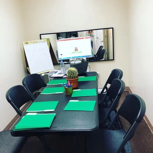 A meeting room set up for a workshop
