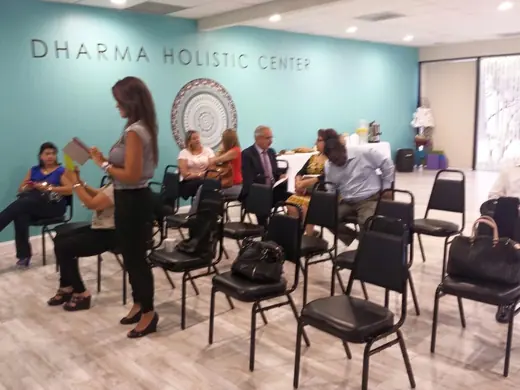 A talk with an audience in a holistic center