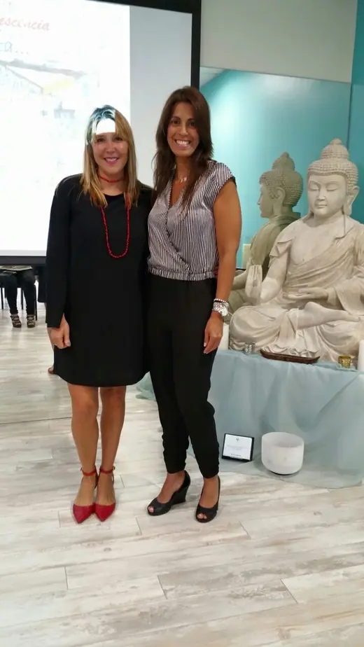 Two speakers posing after a talk